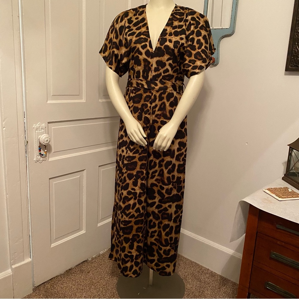 For the people large leopard printed capri length jumpsuit with plunging front